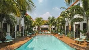 Maison Felix boutique hotel courtyard pool North Beach Miami Beach Florida 1948 restored building