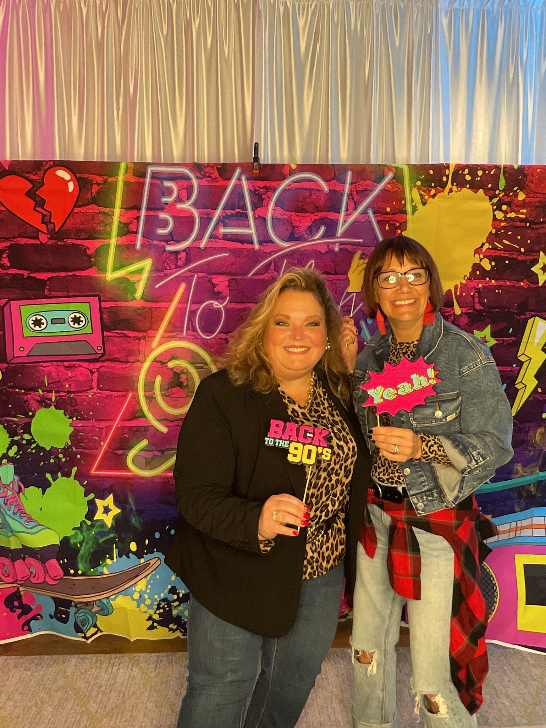 Guests enjoying the BFAIR 30th Anniversary celebration dressed in 90s-themed attire