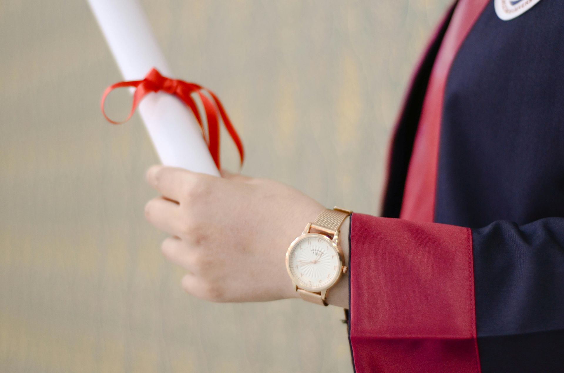 Person holding a diploma