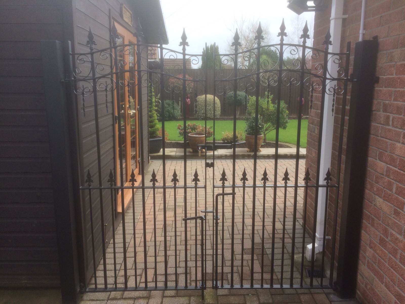 a metal gate of a big house