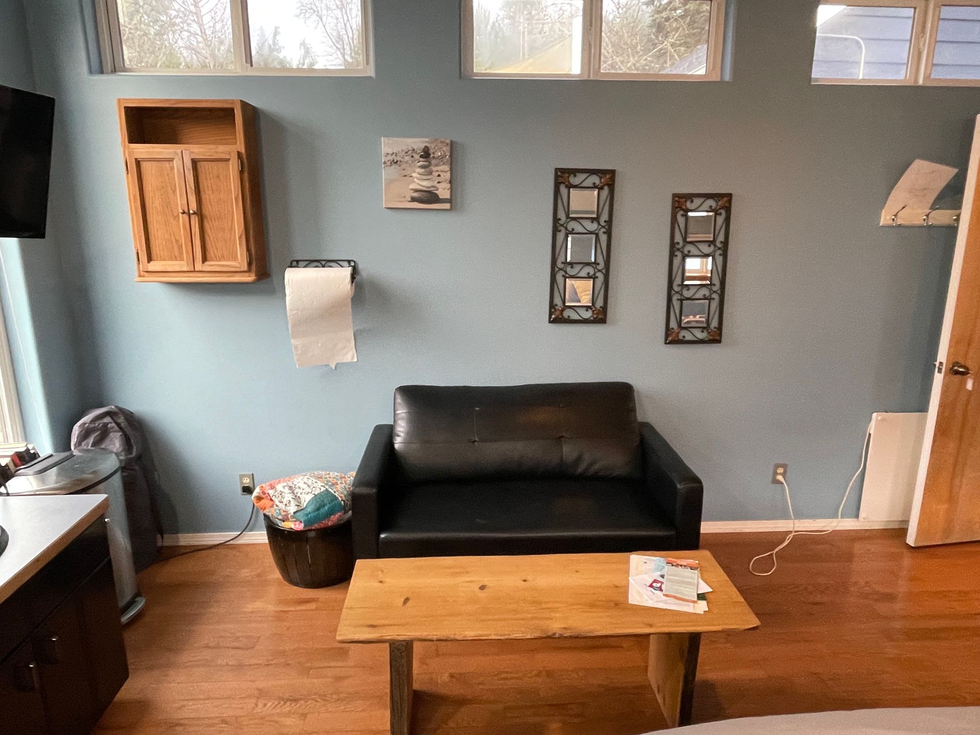 A living room with a couch and a coffee table