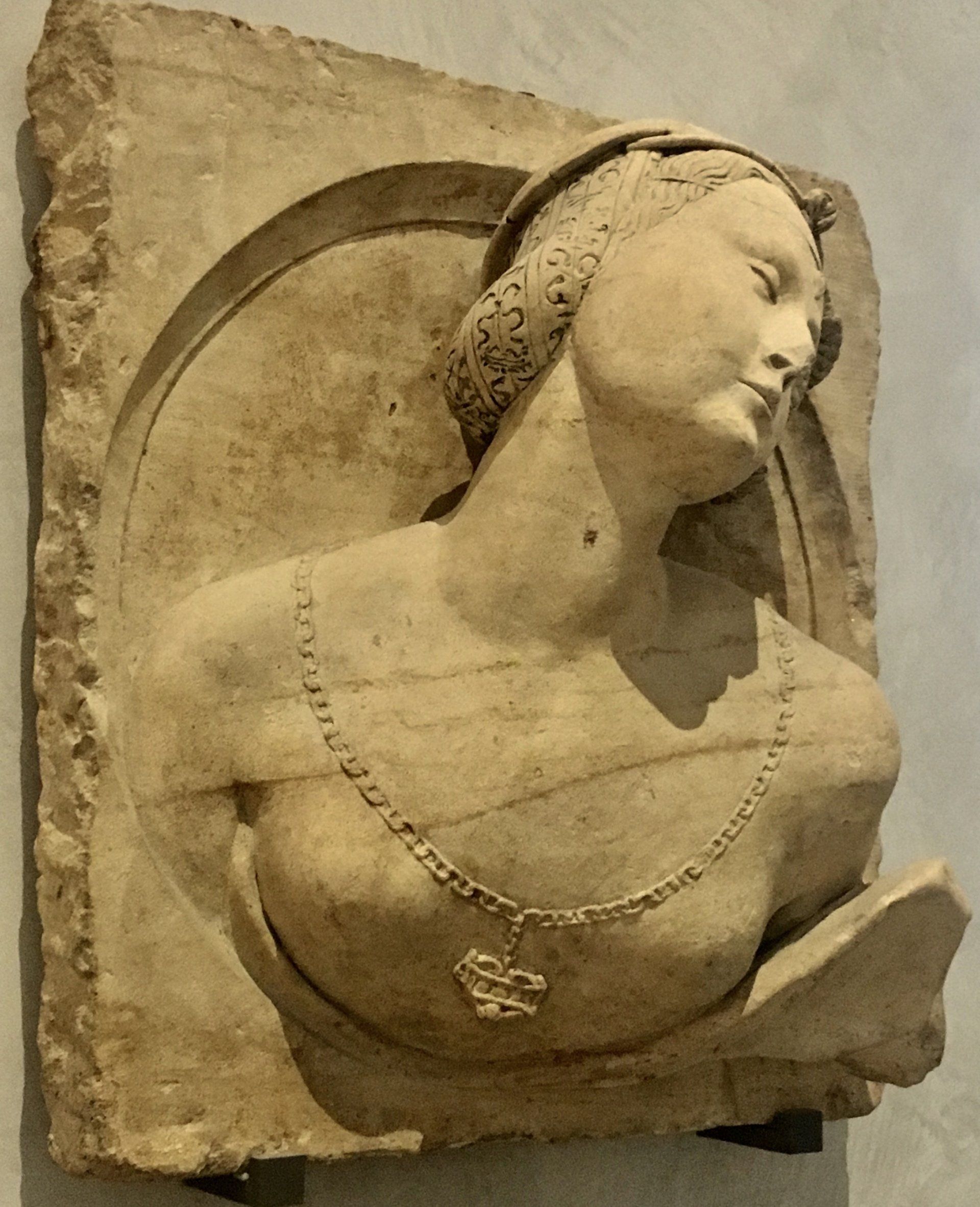 Stone carving of medieval European woman
