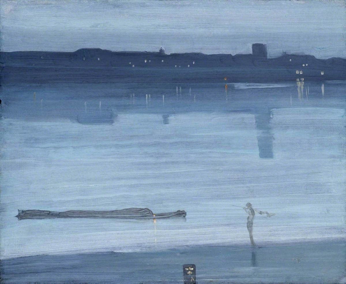 An Impressionist scene showing a solitary figure standing on a blue shoreline at dusk with  lights beginning to be visible o the distant shore.