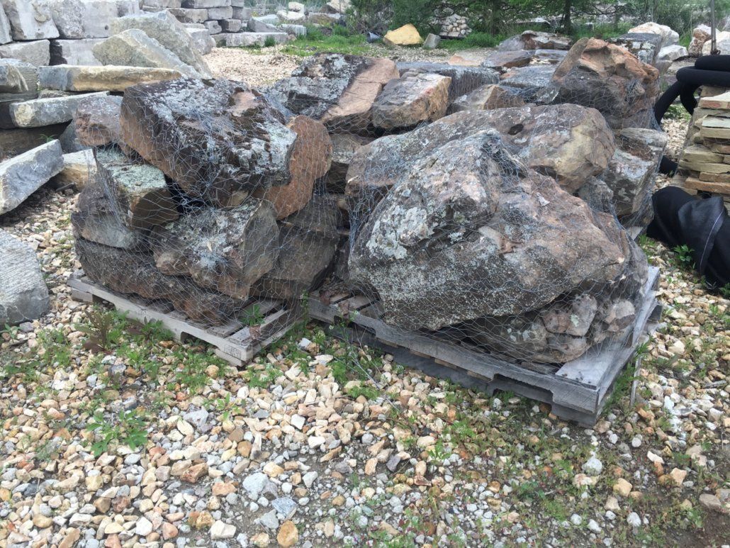 Mossy boulders at landscaping project