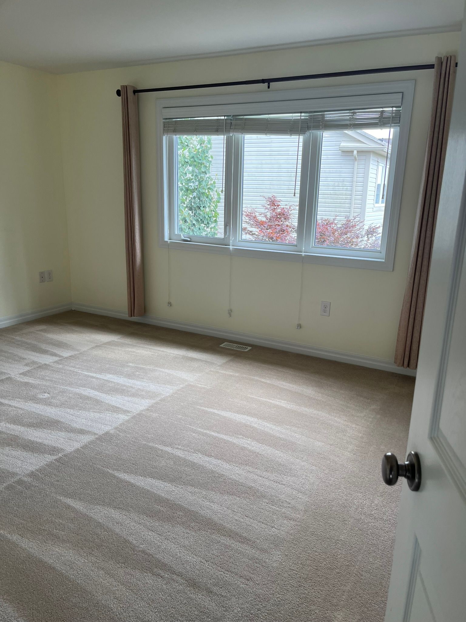 There is a large window in the middle of the room.