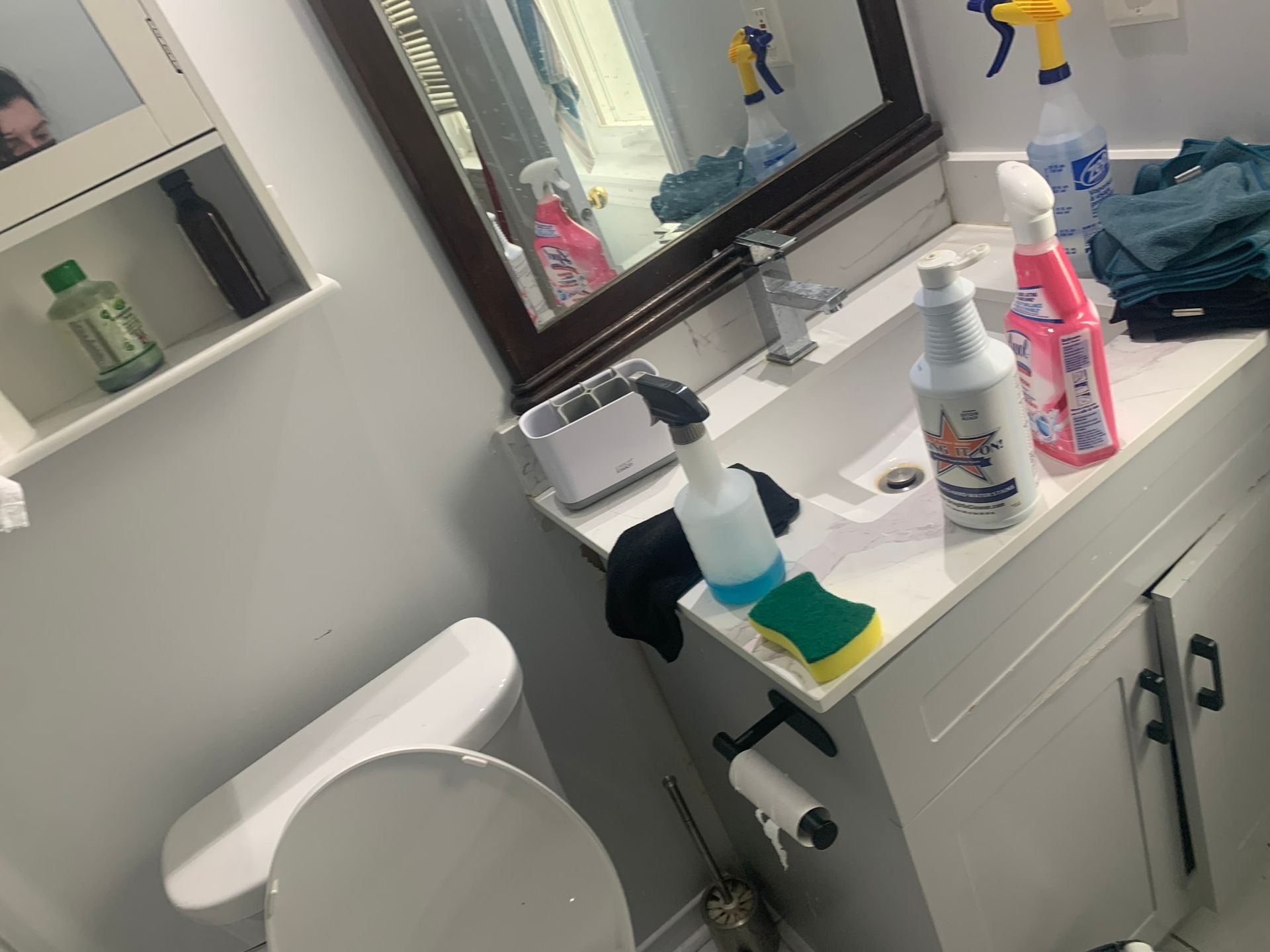 A kitchen with a black stove and a black refrigerator
