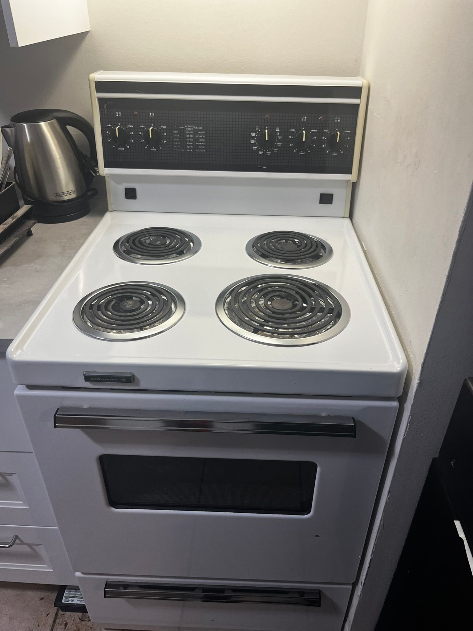 A kitchen with stainless steel appliances and granite counter tops
