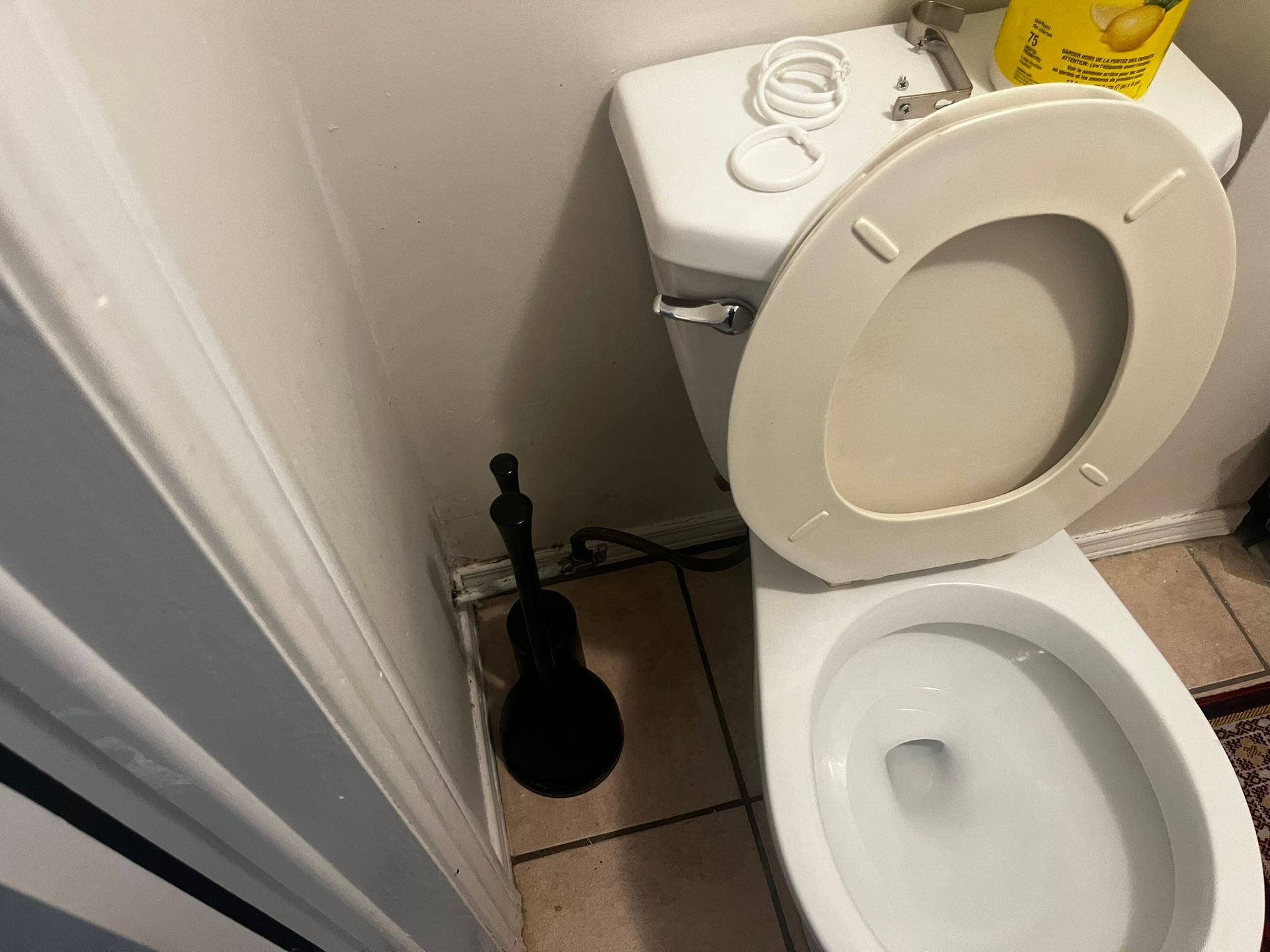 A kitchen with a stove a sink and a table