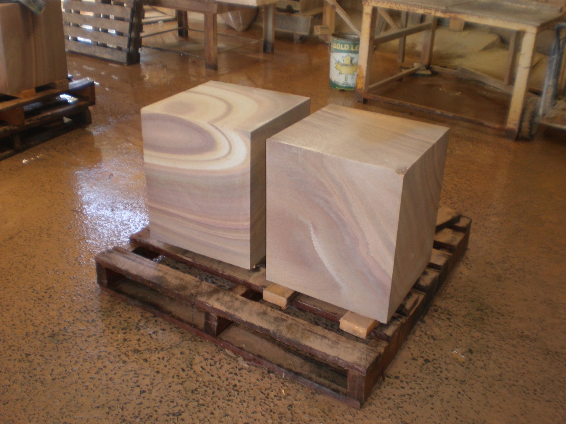 Two Rectangular Stone Blocks on a Wooden Pallet — Australian Sandstone Products In Tweed Heads, QLD