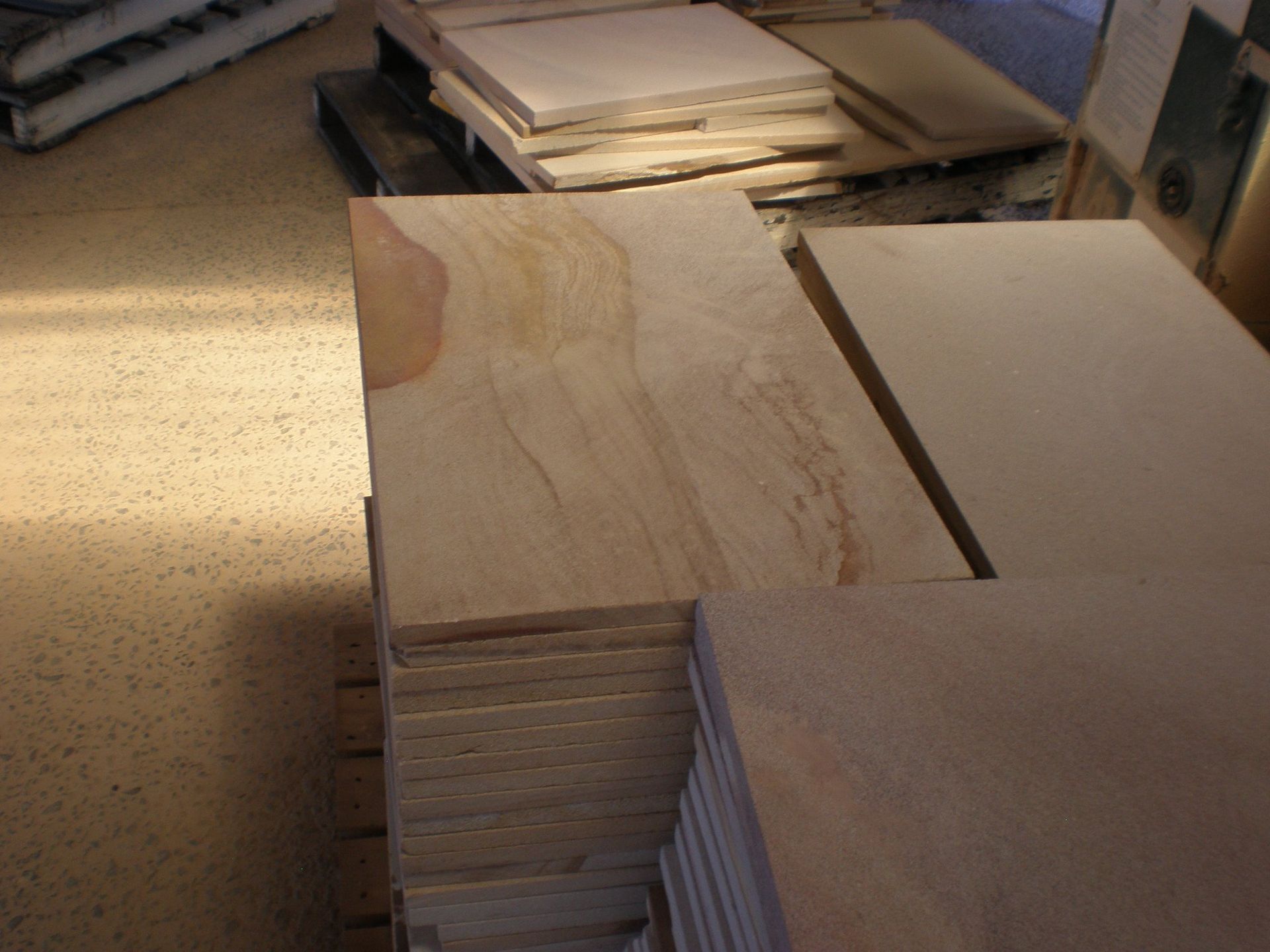 Stacks of Light-colored Stone Tiles, Possibly Sandstone — Australian Sandstone Products In Tweed Heads, QLD