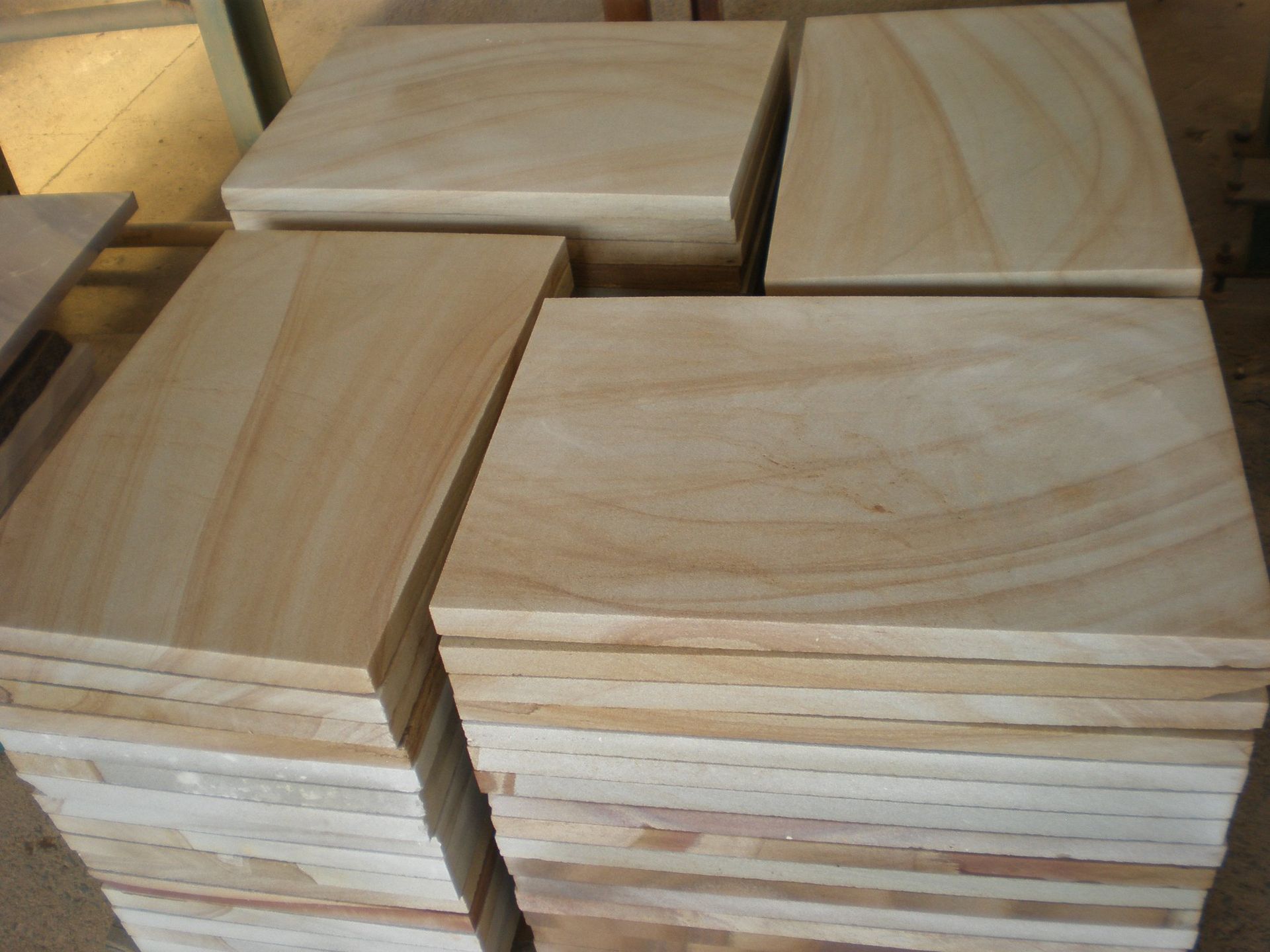 Stacks of Beige Sandstone Tiles Ready for Construction — Australian Sandstone Products In Helidon, QLD