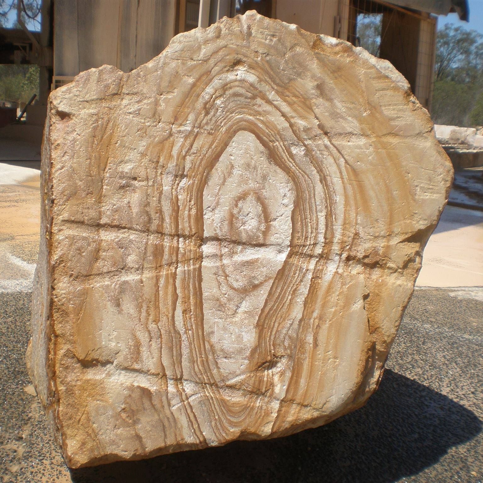 Brown and Tan Banded Rock With Concentric Oval Patterns — Australian Sandstone Products In Toowoomba, QLD