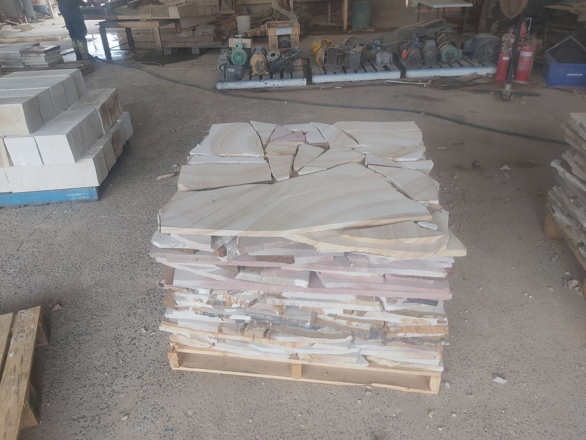 Stack of Irregular Tan and Pink Flagstone Pieces — Australian Sandstone Products In Toowoomba, QLD