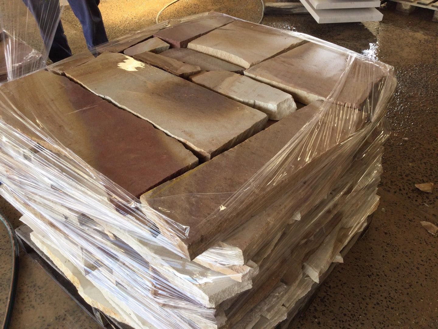 Pallet of Rectangular, Tan and Reddish-brown Stone Tiles — Australian Sandstone Products In Toowoomba, QLD