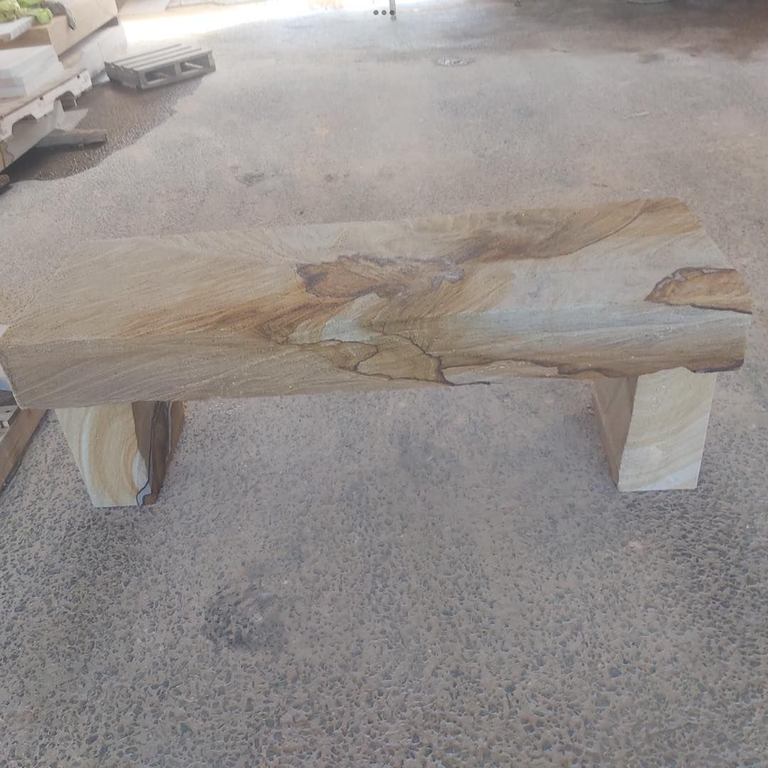 Stone Bench With Tan and Brown Hues, Set on a Cement Floor — Australian Sandstone Products In Highfields, QLD
