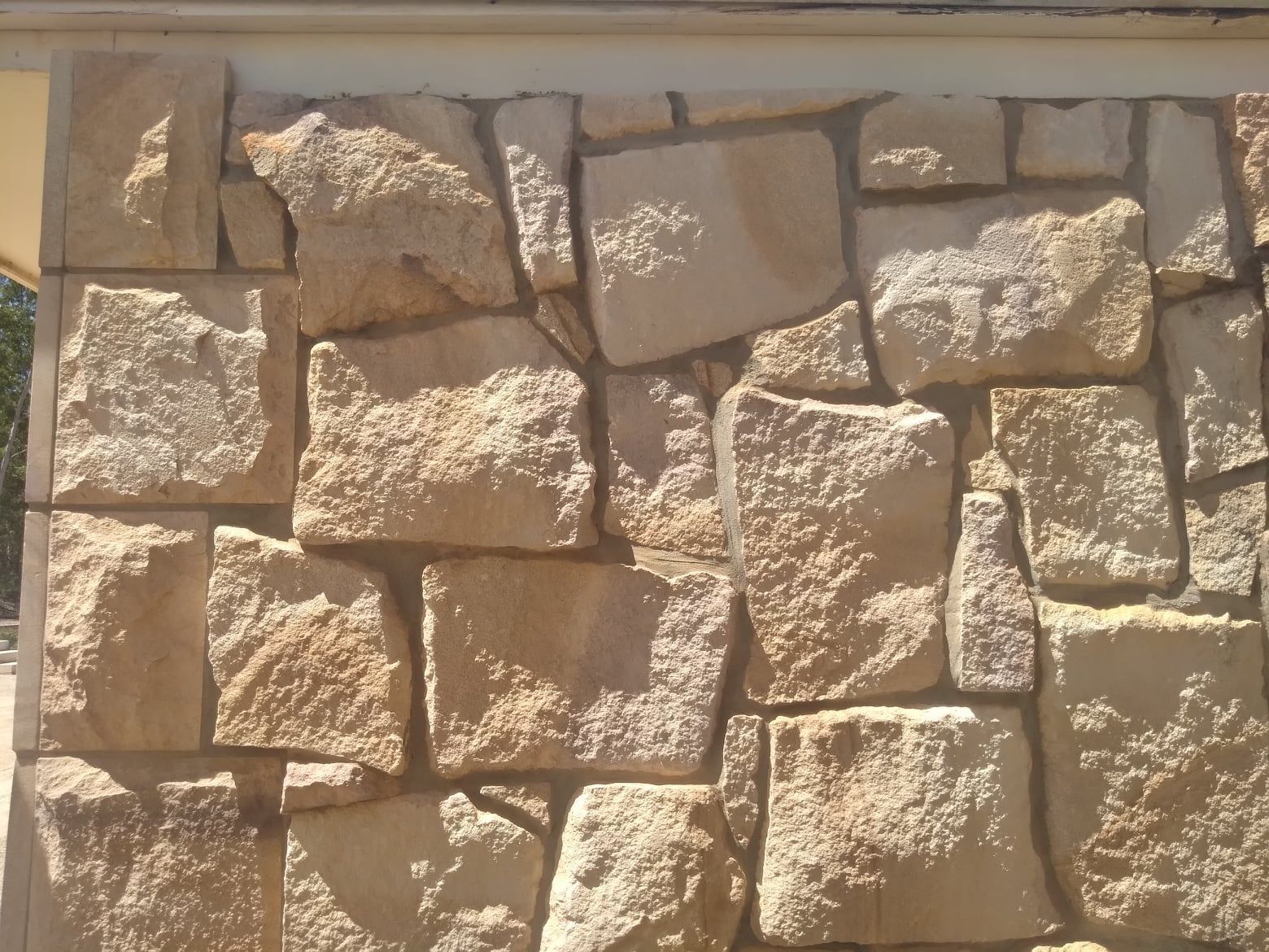Tan and Beige Stone Wall With Varied, Rough-hewn Rectangular Blocks — Australian Sandstone Products In Gold Coast, QLD