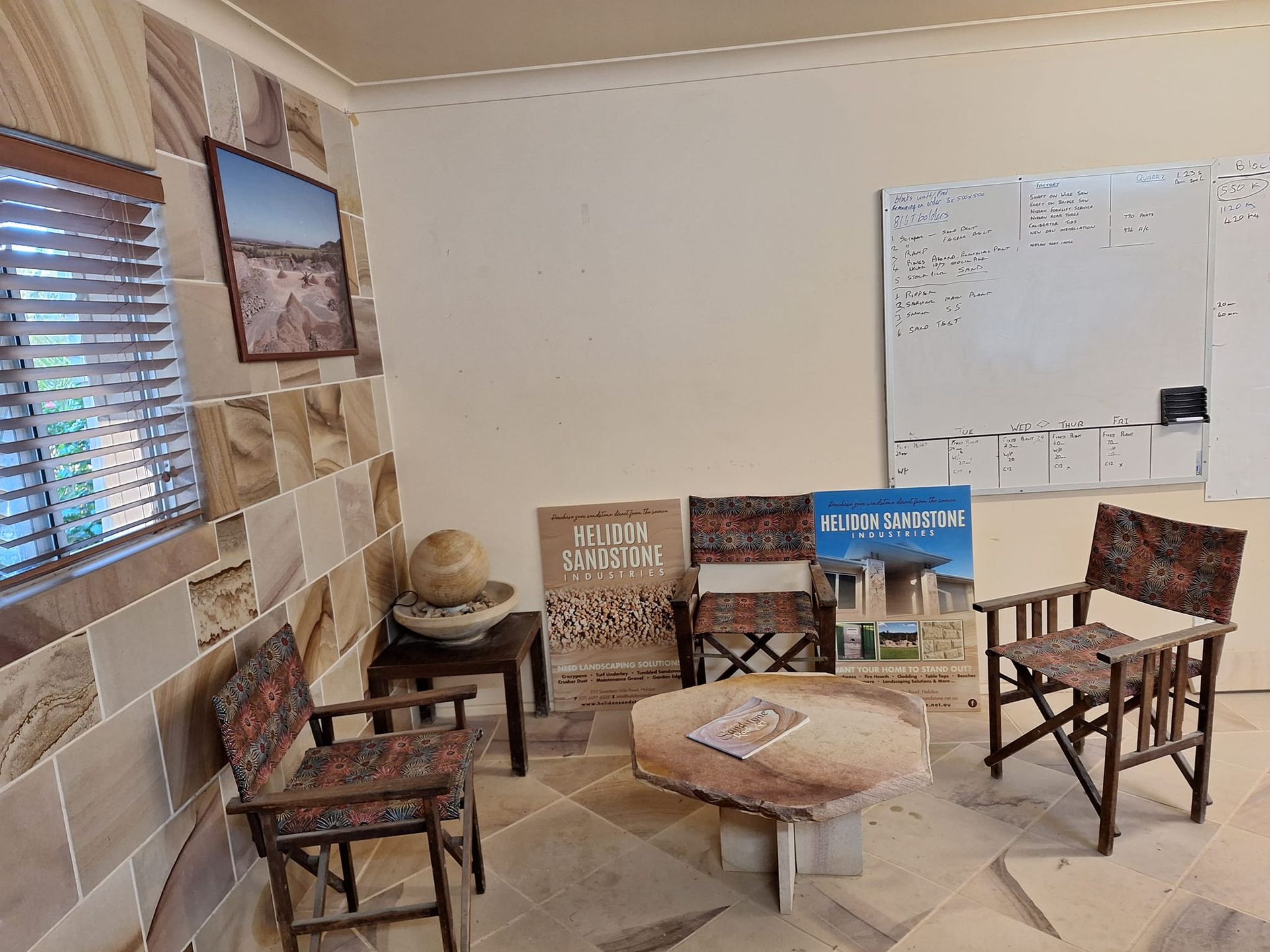A Room With Stone Walls, Wooden Furniture, and a Whiteboard — Australian Sandstone Products In Gold Coast, QLD