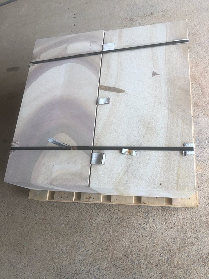 Wooden Crate on a Pallet, Secured With Metal Bands and Clips — Australian Sandstone Products In Noosa, QLD