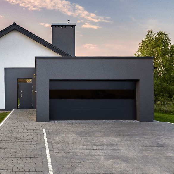 A modern house with a black garage door