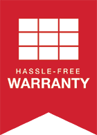 A red sign that says hassle free warranty