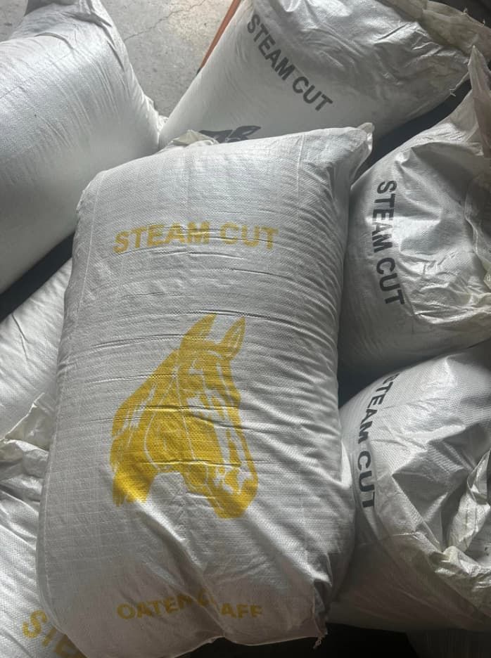 A Pile Of Bags With A Horse Head On Them — Paint Horse Saddlery In Taree, NSW