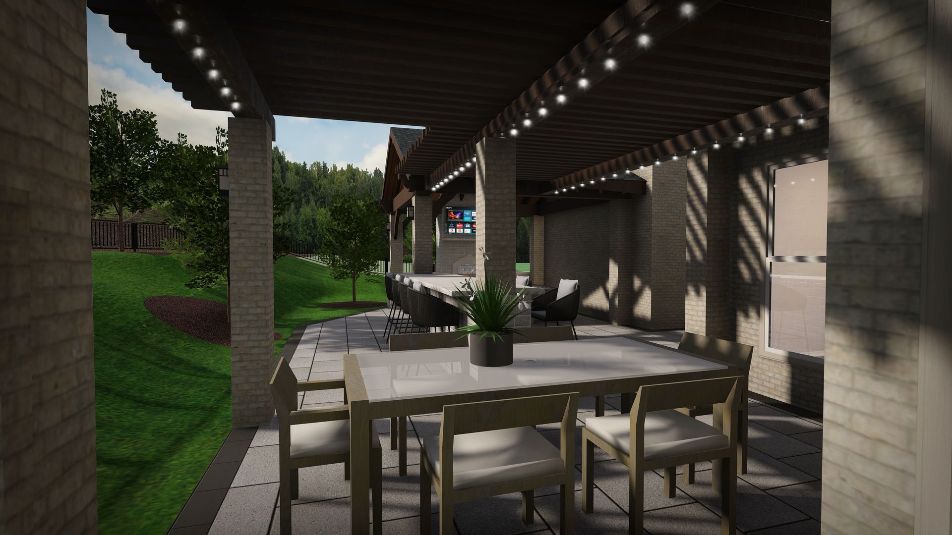 Covered patio with dining table and chairs, overlooking a green lawn with trees.