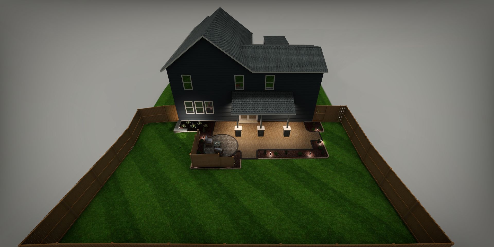 A model of a dark house with a wooden deck, surrounded by a green yard and a brown fence.