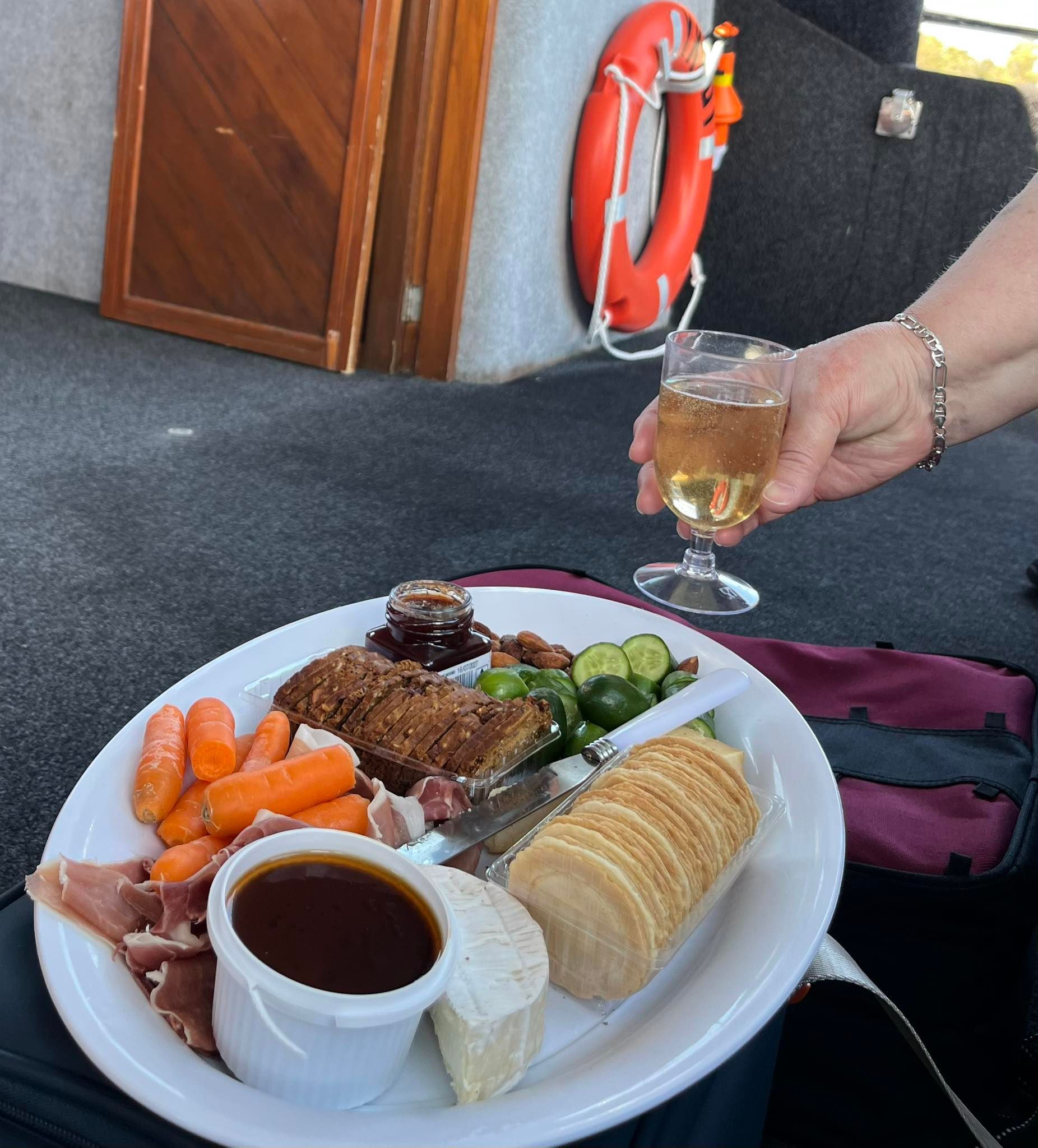 Plate of Food and Drink on A Boat — YKnot Cruises in Nelson Bay, NSW
