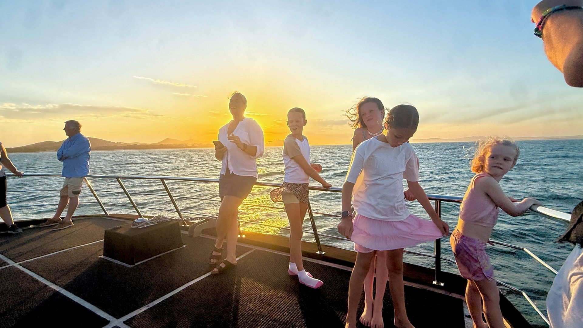 People on A Boat Looking at Something in The Water — YKnot Cruises in Nelson Bay, NSW