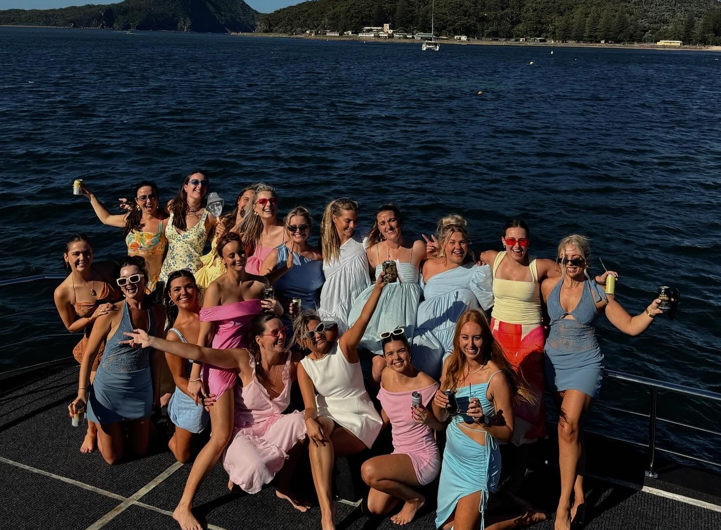 Group of People on A Boat, Posing for A Photo — YKnot Cruises in Newcastle, NSW
