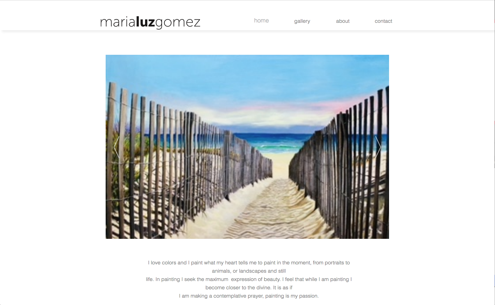 A path leading to the ocean, framed by weathered wooden fencing and beach grass, under a blue sky.