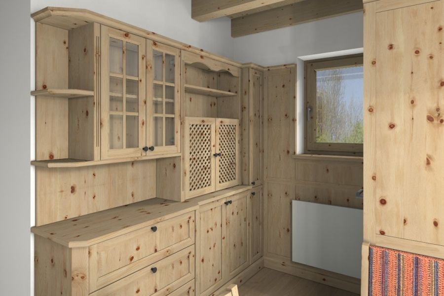 Helle Holzschränke mit Glastüren und Gittertüren, die an einer Wand mit Fenster und Heizung angebracht sind.