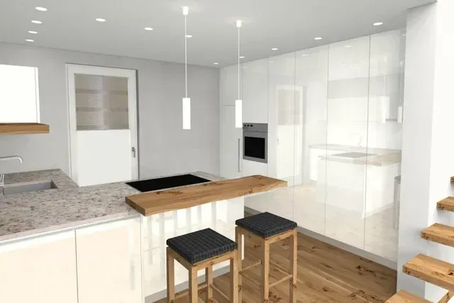 Eine moderne Küche mit weißen Schränken