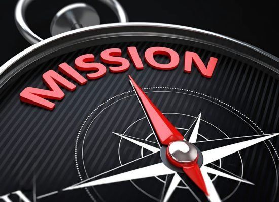 Compass pointing to the word 