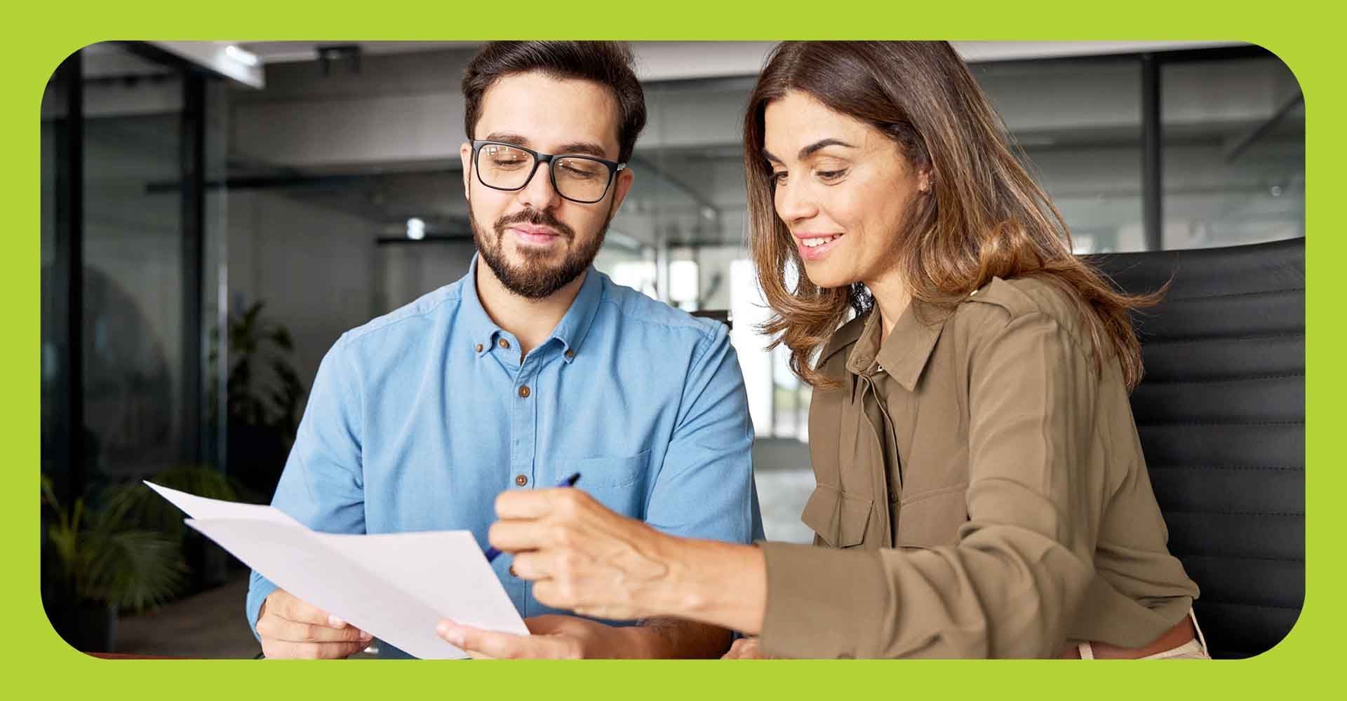 A man and a woman in an office setting