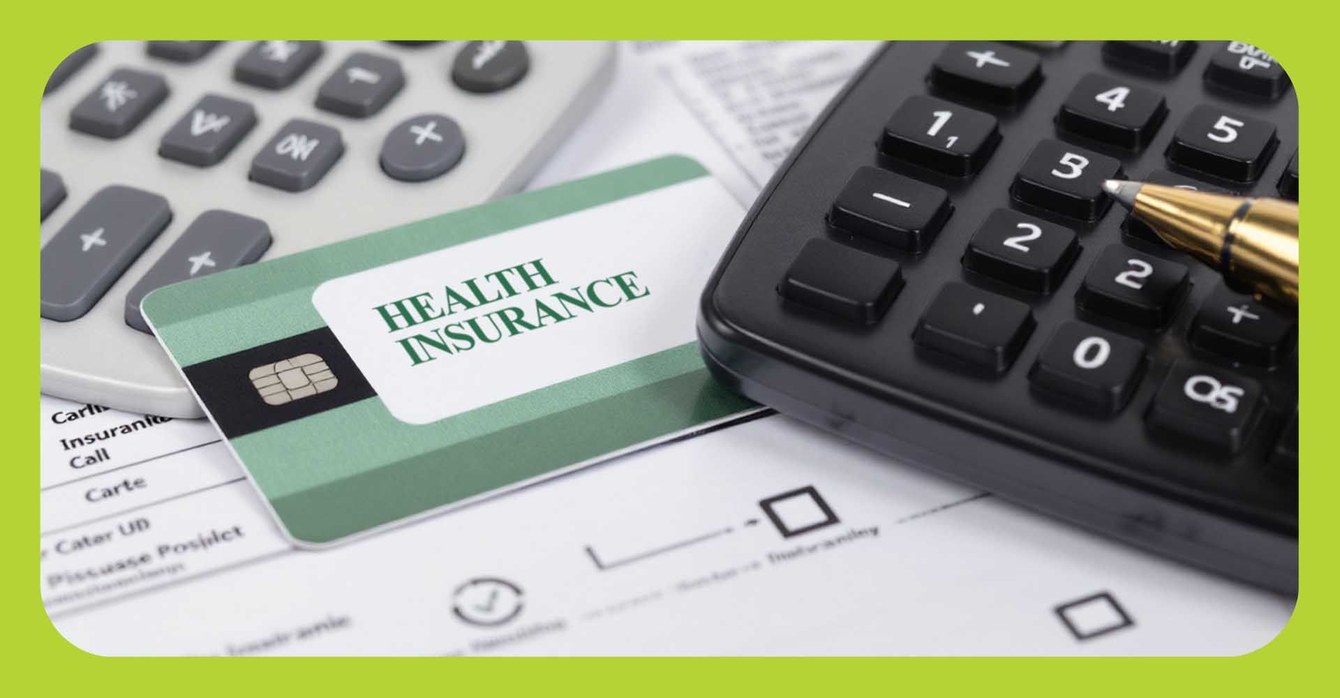 A health insurance membership card next to calculators and paperwork