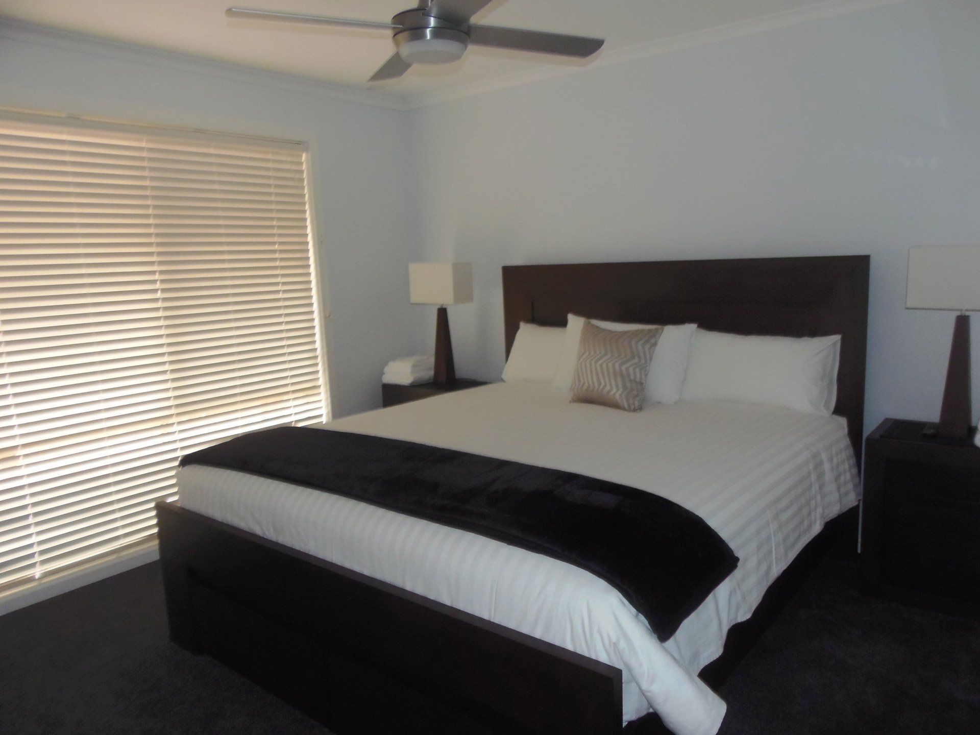 Stay at Halls Gap Valley Lodges. Master bedreoom Hideaway Villa with King bed.