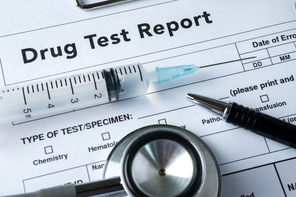 Drug Test Report With a Syringe, Stethoscope, and Pen — DAB Services in Bowen, QLD