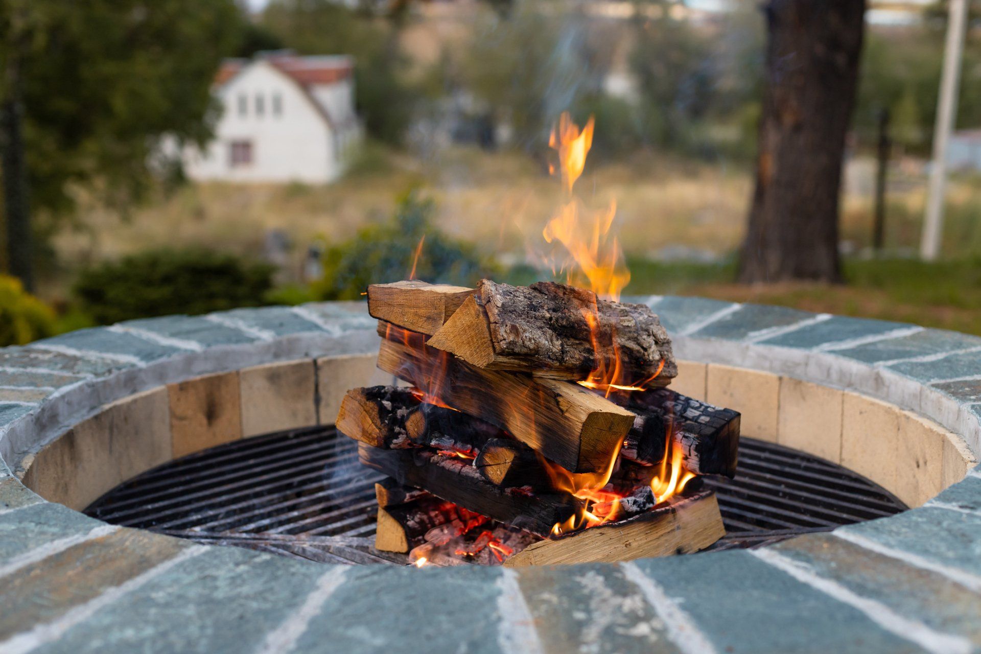 Outdoor Firepit with Firewood — Goodrich, MI — Firewood & Coal Sales