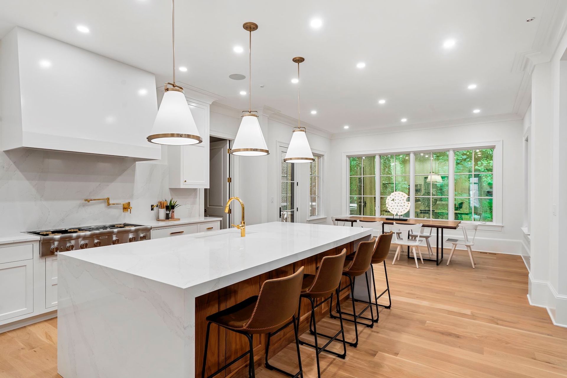 There is a large island in the middle of the kitchen.