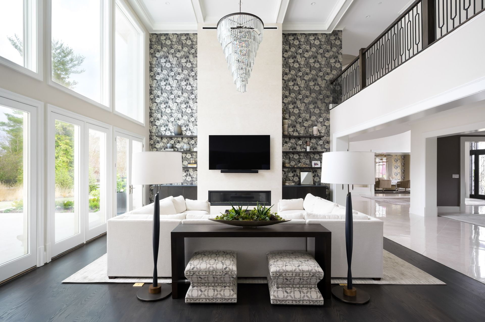 A living room with a fireplace and a flat screen tv