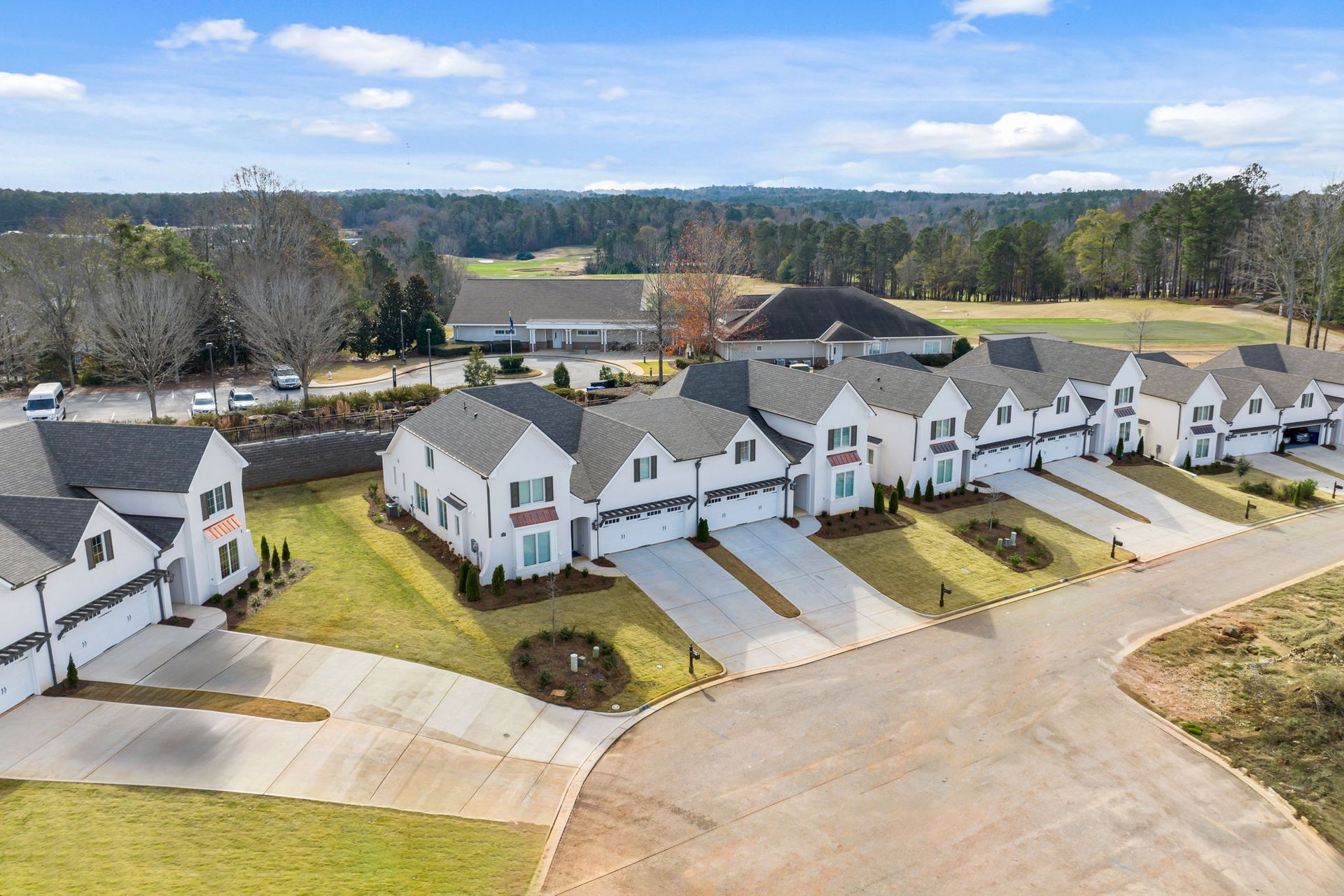 An aerial view of a row of houses in a residential area.