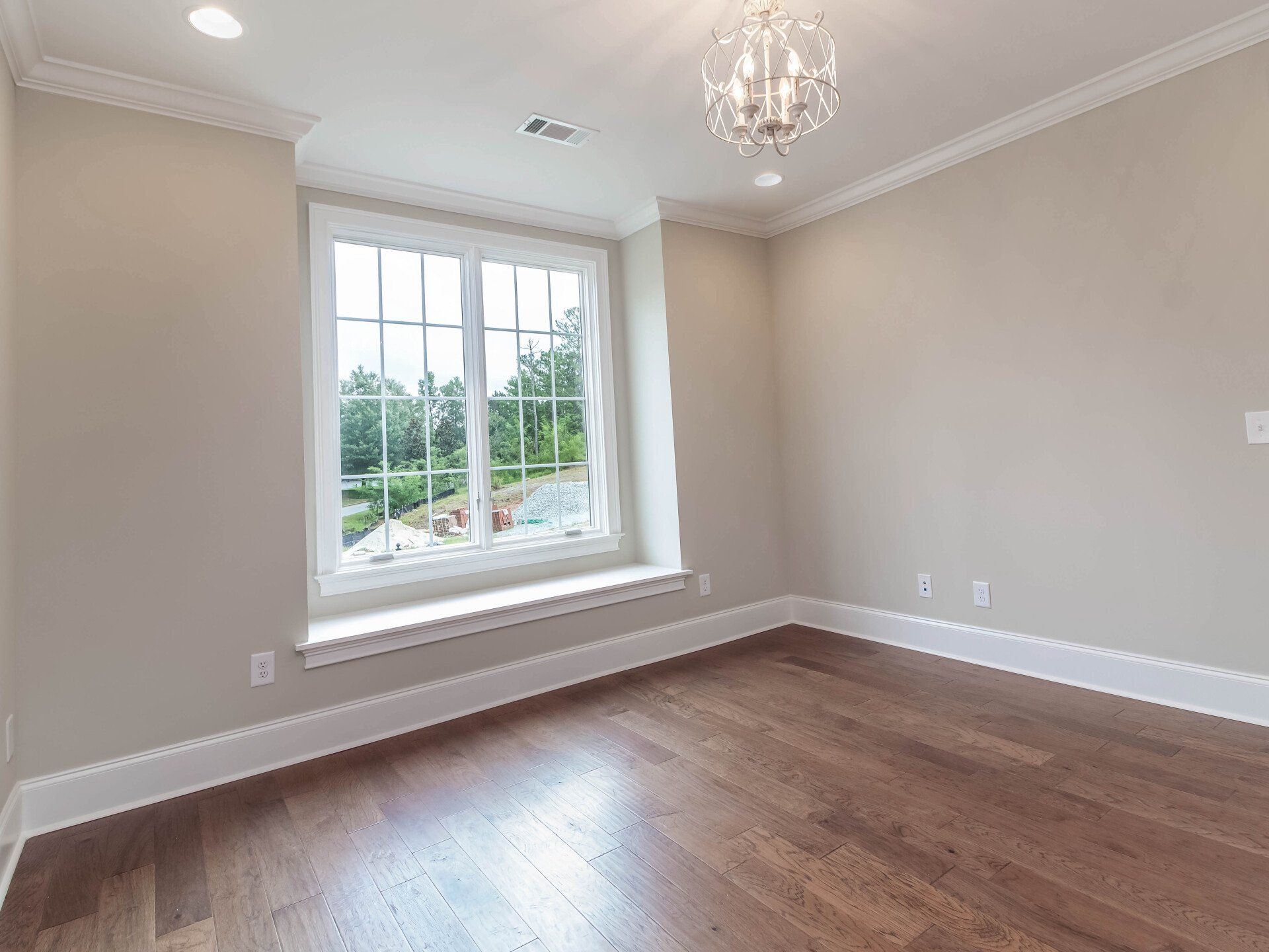 There is a large window in the middle of the room.