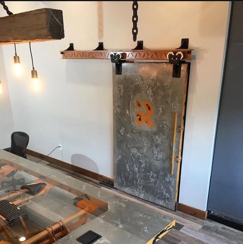 An empty office with a long counter and drawers