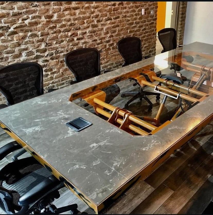 A close up of a concrete floor with a sponge on it.