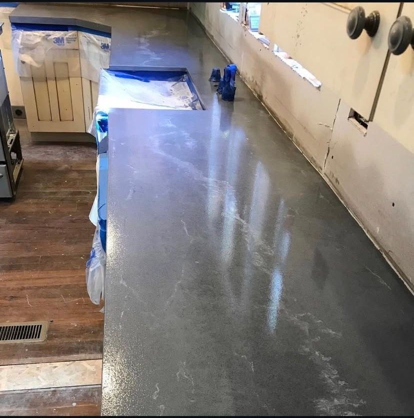 A hallway with the word camp painted on the floor