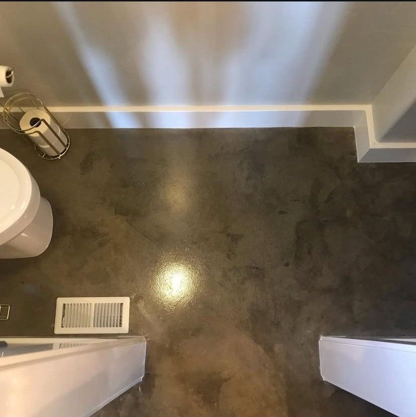 A dining room with a table and chairs in it