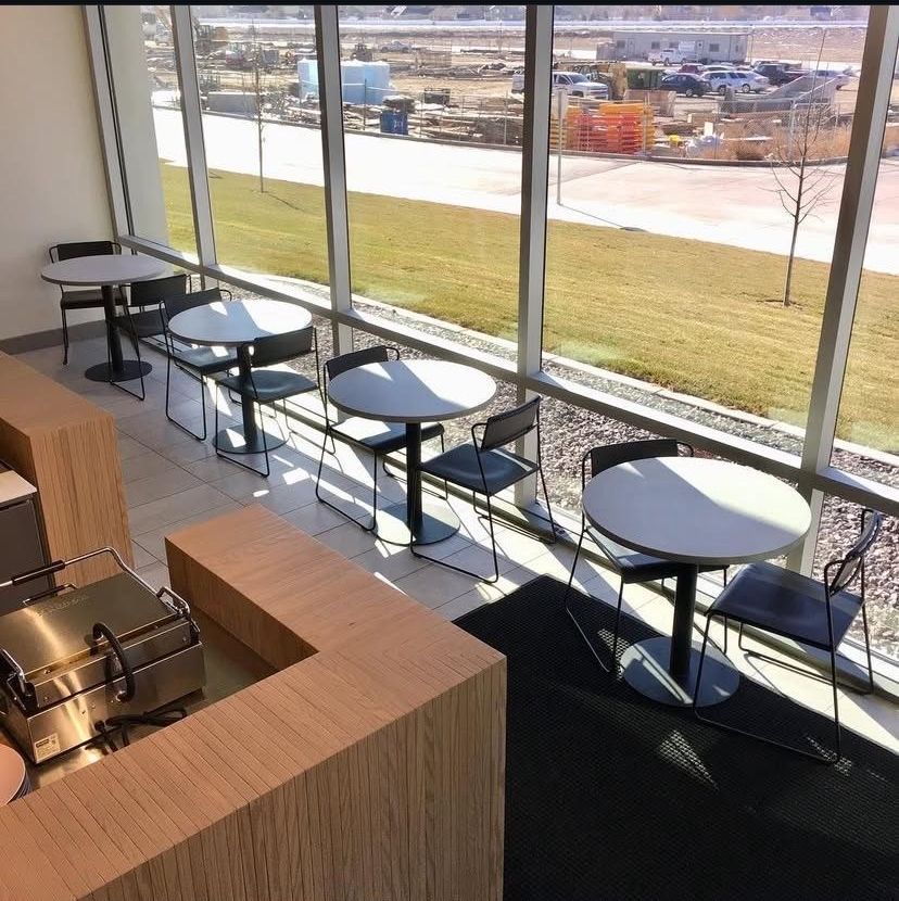 A bathroom sink with a counter top that looks like a terrazzo counter top.