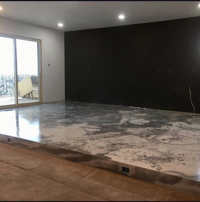 A staircase in a building with a railing and wooden steps