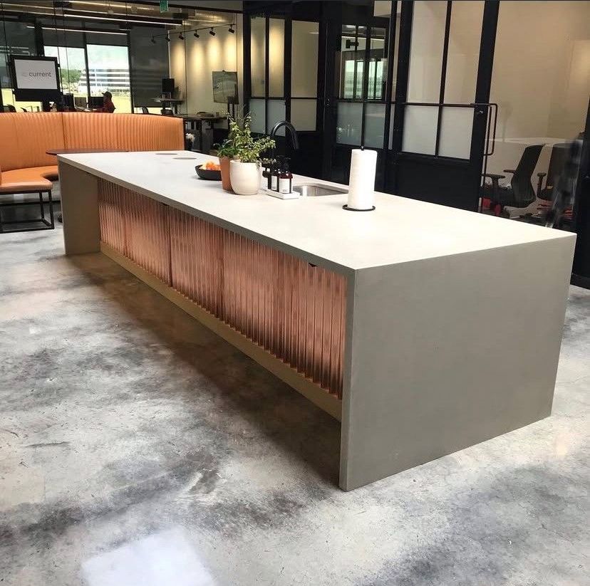 A logo for catholic youth expeditions is on the floor